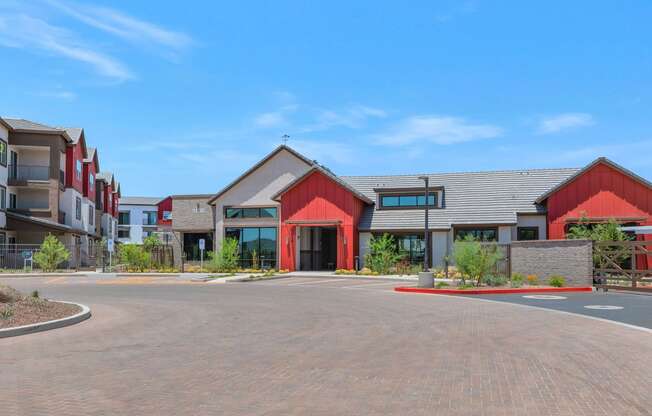 an empty parking lot in front of an apartment buildingat Weylyn Luxury Apartments, Laveen, AZ
