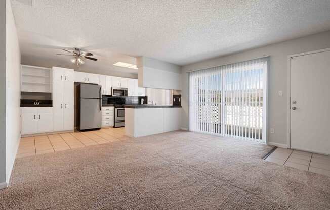 Apartments for Rent in Gilroy - Mission Park - Spacious Living Room with Plush Carpeting and Access to the Kitchen