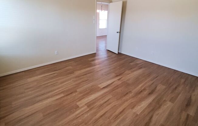 Cute 3 bed 2 bath in Huning Ranch Vinyl plank flooring throughout!