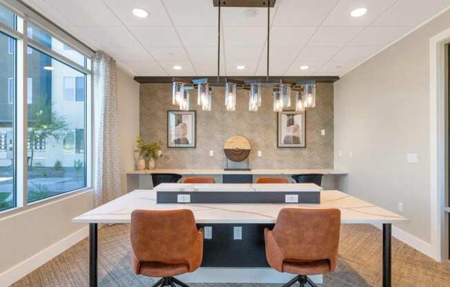 Business center workstations at Glen 91 Apartments in Glendale, AZ