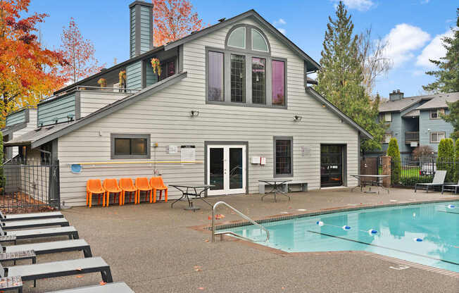 A house with a pool in the backyard.