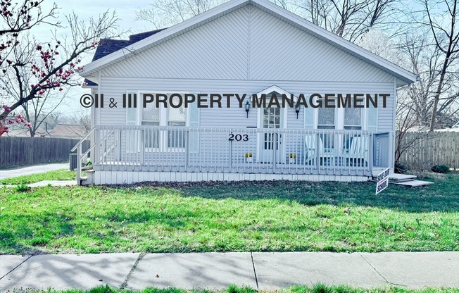 203 SE 1 ST