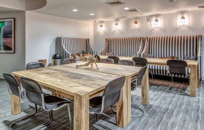 A conference room with a long wooden table surrounded by chairs at Esprit Marina del Rey, 90292