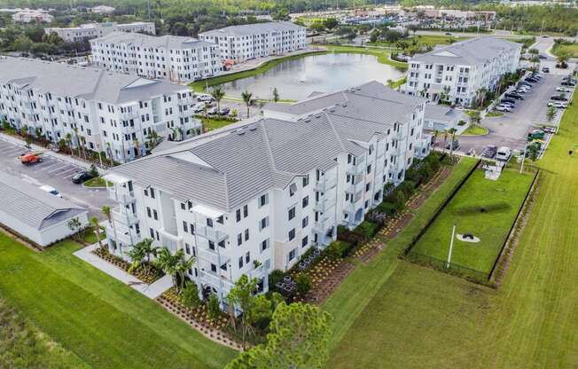 Aerial View of Apartment Buildings and Greenery at Edge75, Naples, FL 34104