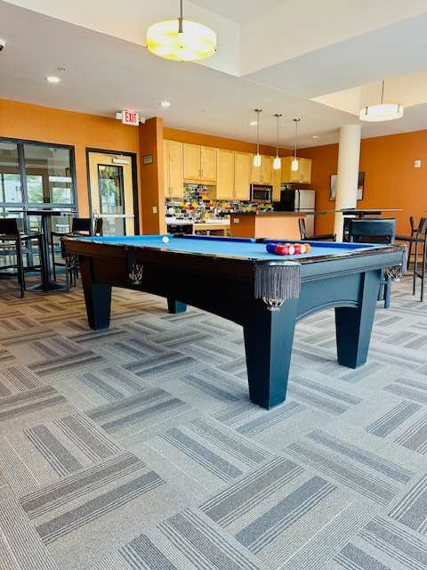 a pool table in a living room