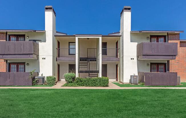 a large lawn in front of a house