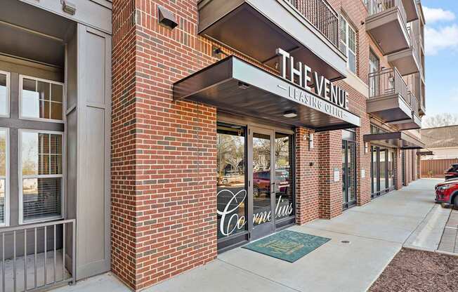 The entrance to a building with a sign that reads "The Venue."