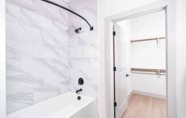 Relax in spa-like soaking tubs and walk-in showers with full-height tile. Experience oversized closets with wood rods and built-in storage.