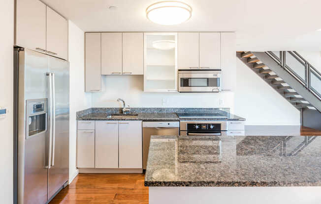Kitchen with Stainless Steel Appliances and Granite Counters