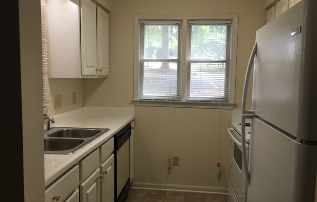 ONE LEVEL CONDO NEAR REX HOSPITAL -Fireplace * Home Owner's Association