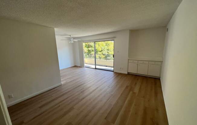 Living Room with Hard Floors and Bar