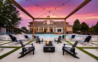 firepit with sitting area at swimming pool patio