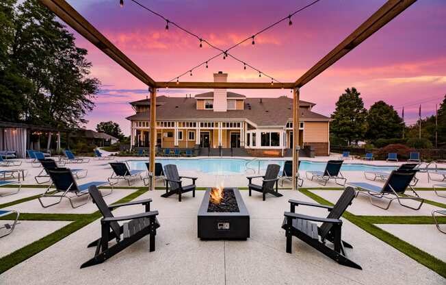 firepit with sitting area at swimming pool patio