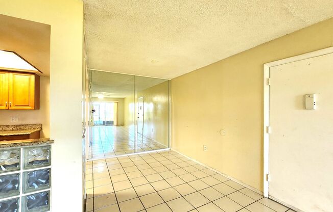 Ground Floor Unit; Lake Front View; All-Tile Flooring; Pool/Tennis/Laundry