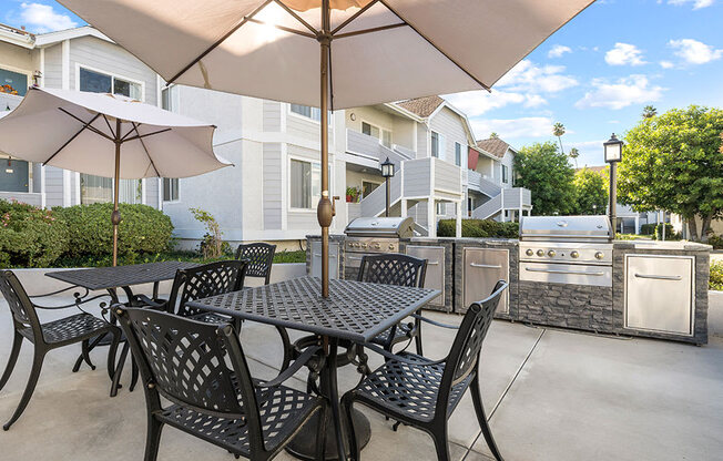 Outdoor barbeque and seating space in main courtyard.