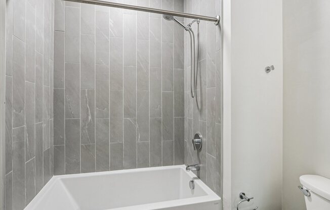 Bathroom with white bathtub at Park77 Apartments, Cambridge, MA, 02138