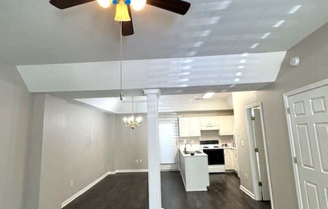 Close to Downtown Greer - this is a Fantastic 2 Bedroom, 2.5 Bathroom end unit condo that offers tons of storage and open space.