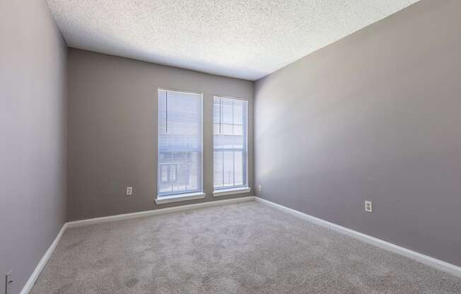 Westchase Apartments in Harvey LA photo of bedroom with large windows