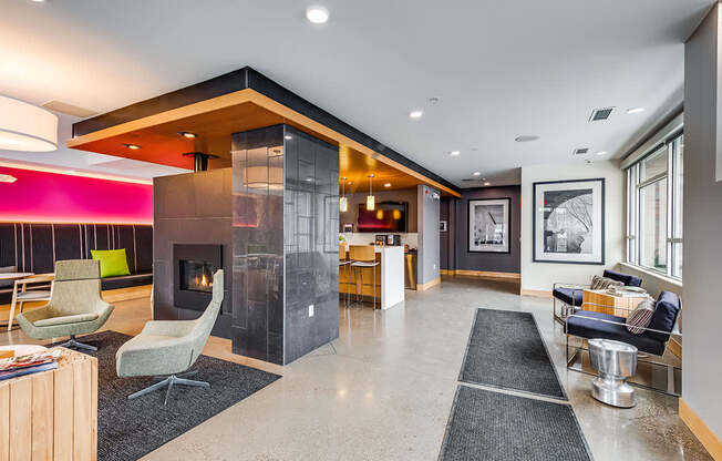 Clubhouse with a fireplace and comfortable seating.
