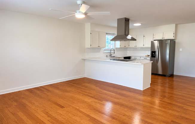 Charming 2 Bed Brick Home with Updated Kitchen, Hardwood Floors & Spacious Backyard