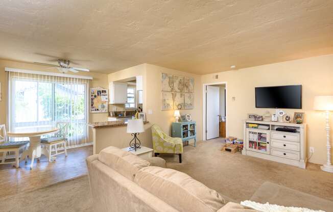 a living room with a couch and a tv