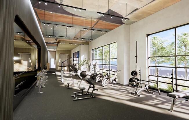 Club-quality fitness studio with spin bikes and group fitness area at Modera Revere Beach in Revere, MA.