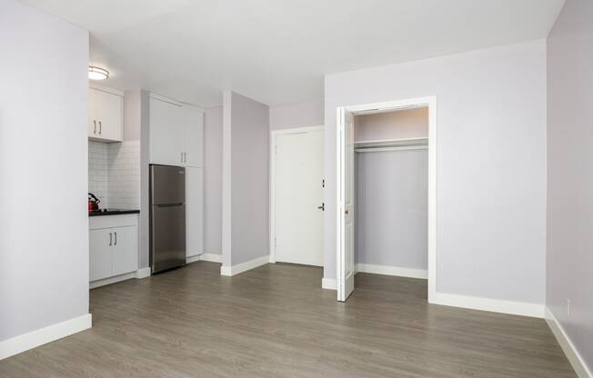 a kitchen and living room in a 555 waverly unit