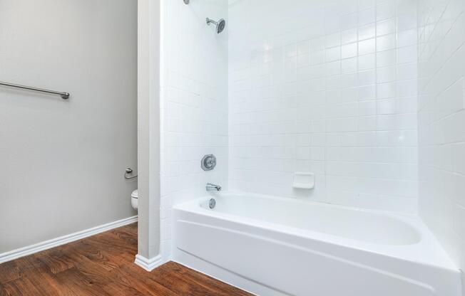 a room with a sink and a shower