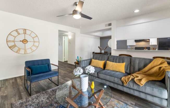 a living room with a couch and a table