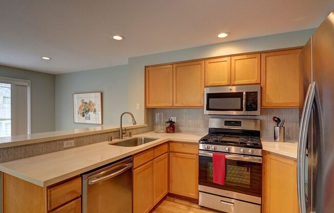 Updated Town Home in heart of Ballard just a few blocks to Market St, stores and restaurants