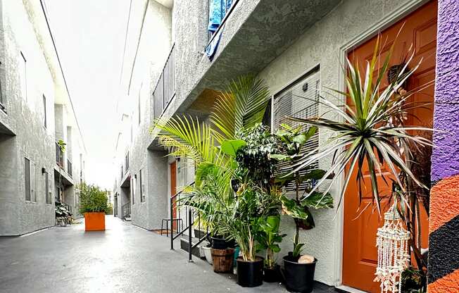 an overhead view of a building with plants in it