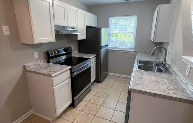 Single Level 2 bedroom 2 full bath brick townhome in Garner $1395/mo.