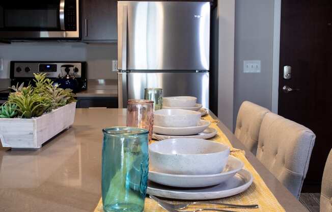 Gourmet Kitchens With Islands at One Glenn Place, Fitchburg