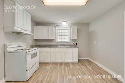 310 W TEXAS ST