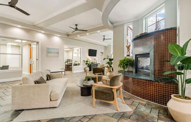 A living room with a fireplace and a couch.