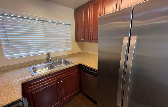 CONDO—PRIME 2 BED 2 BATH IN CENTRAL WOODLAND HILLS GATED COMMUNITY