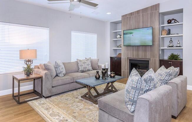 Enjoy the cozy couches in the clubhouse at Boulder Creek