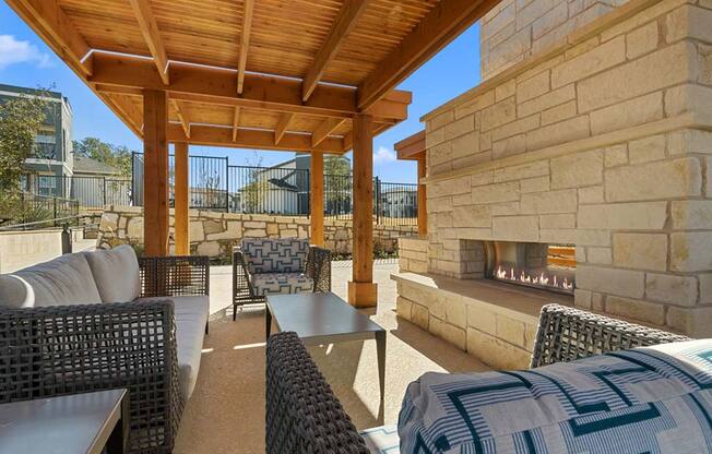 Outdoor sitting area with firepit at Reveal 54, Georgetown, TX