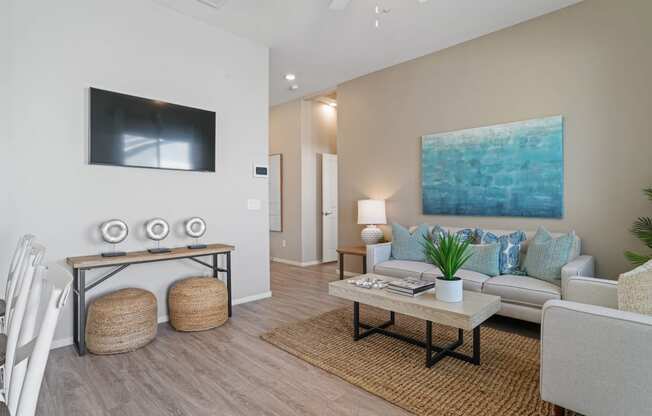 a living room with a couch and a table