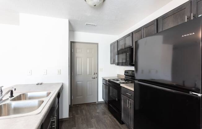 kitchen with black appliances