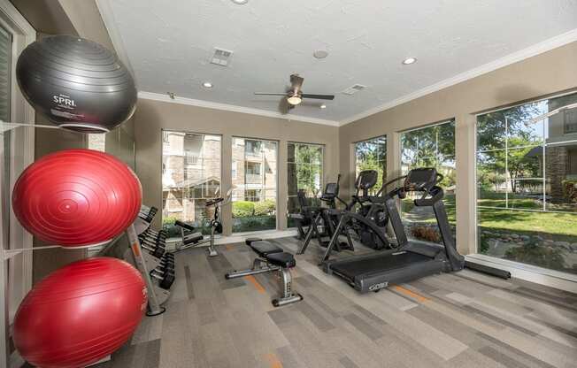 Gym with treadmills at Woodbridge Villas Apartments, Sachse, TX