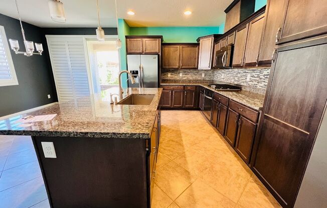 Gorgeously upgraded single Story 3 Bed 2 Bath home Inside Rhodes Ranch Guard Gated Golf Course Community!