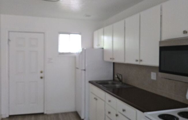 1198-1199-1200-1201:  9404 Candelaria Blvd NE