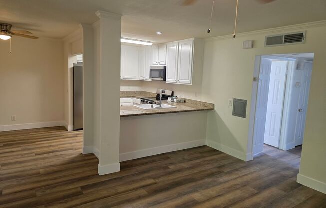 Special!! Newly renovated with new appliances 3 bedroom upstairs condo in gated community available now