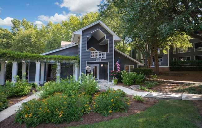 A house with a flag on the front porch.