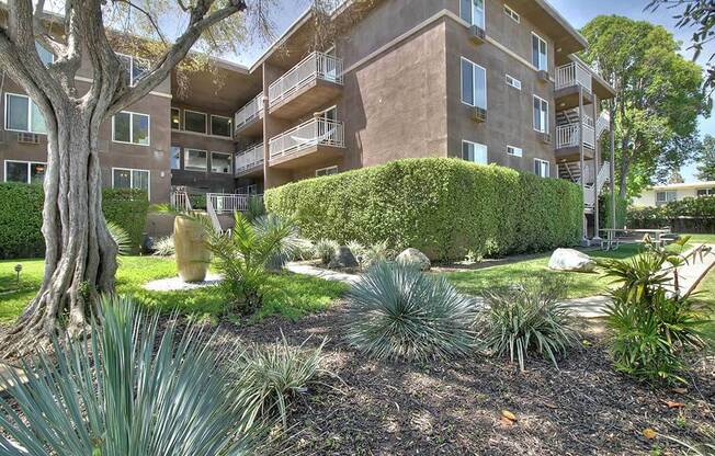 Outdoor plants and trees wit hedges at The Luxe, California, 95051