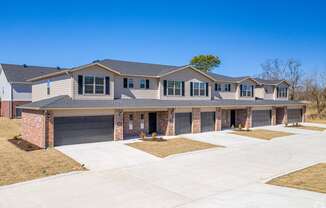 a large house with a driveway in front of it