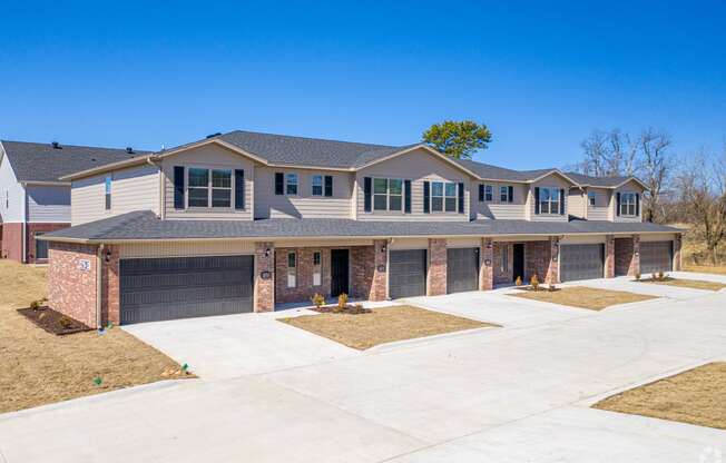 a large house with a driveway in front of it