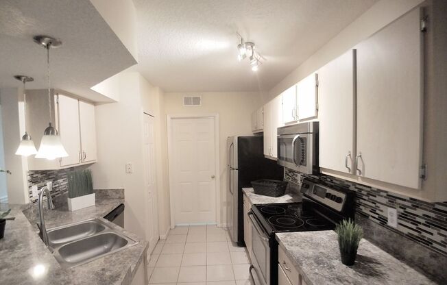 Gorgeous  Forest View, Wood Floors  1/1 condo for RENT @The Crest close to UCF.