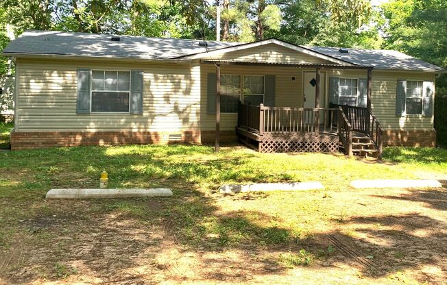 3 Bed/2 Bath 1100+ sqft. Privacy, but in town!!! Sitting on nearly 1/2 acre lot!